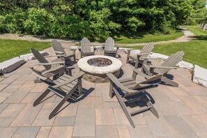 Gather around the gas firepit for cozy evenings under the stars.








