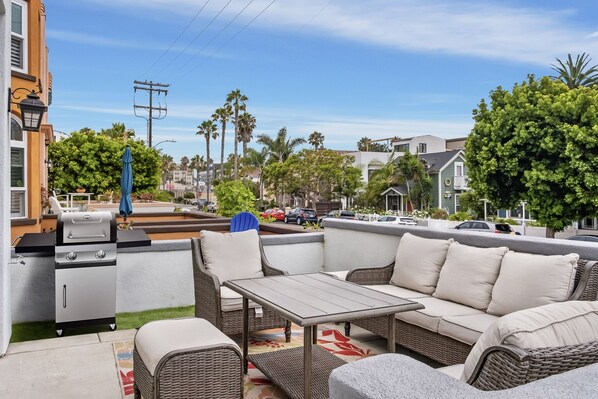 Enjoy the front deck with a BBQ grill, plenty of seating, and a cool ocean breeze!