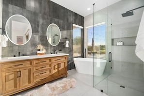 Stunning Master bathroom with soaking tub and walk in shower-pure luxury.