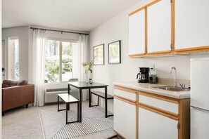 Kitchenette with microwave, mini-fridge, and coffee maker. Perfect for a quick breakfast to enjoy on the patio!