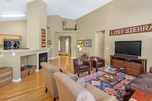 Spacious Living room looking back to entry