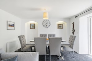 Rosevilla Farmhouse, Portreath. Ground floor: Large dining table with seating for up to six people.