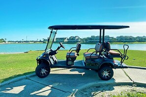 A new, 6-seater golf cart is included with this property, which is a $150/day value (based on local rental rates). The golf cart is perfect for shuttling people to the beach or cruising to the numerous restaurants in the area. The beach front road, Scenic