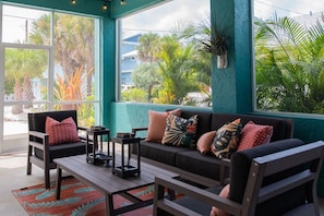 Spacious Screened Lanai with Views of the Beach