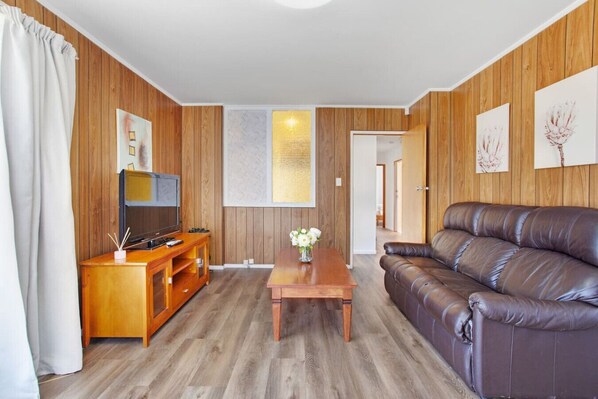 Relax on the couch and watch TV or stream your own Netflix.