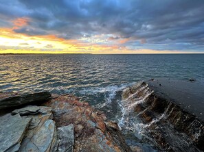 Watch and listen to waterfall from hardscape platform or climb down into water!