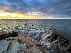 Watch and listen to waterfall from hardscape platform or climb down into water!