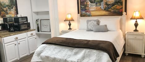 Queen sized bed in the spacious master suite
