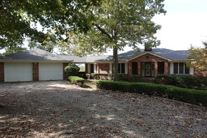 The house and 2 car garage are attached by a covered breezeway. Ample parking. 