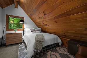 Comfortable and lush queen bed. Romantic and cozy. Mattress topper available.