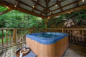 Sink in and relax in your hot tub suitable for 4