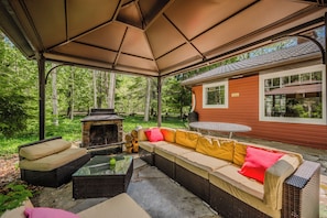 Enjoy the private outdoor lounge with wood burning fireplace. 
