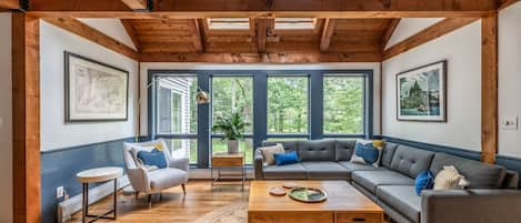 The sunny family room sits just off the kitchen with views of the back yard.