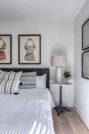 Main bedroom with a king bed and private bathroom. 