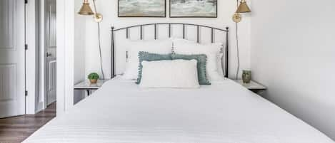 Adorable guest room with a queen bed. 