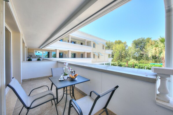 Balcony with table and chairs