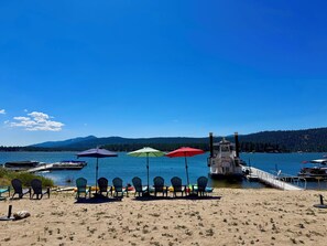 Sandy beach area to launch kayak, swim or relax at North Shore Landing.