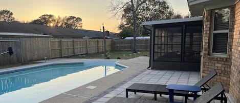 Relax by the large private pool