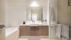 Stunning bathroom with bath and shower