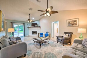Living Room | Single-Story Home | Smart TV | Wood-Burning Fireplace