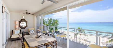 Enjoy meals with incredible beachfront views.