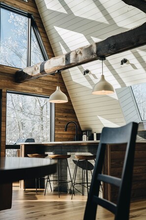 View of kitchen from dining table