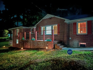 Our home is well-lit with outdoor lights to illuminate the walkway.