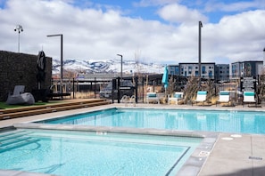 Even with snow on the mountains, you can hang out in the jacuzzi and enjoy the sites.