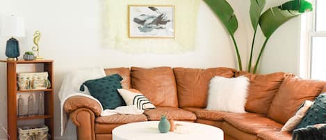Leather reclining sectional with pull-out-bed in the living room