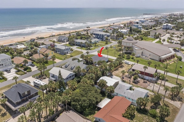 Bird’s-eye view of your perfect beach escape—just one block from the ocean and steps to the sand.