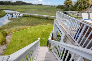 Explore the pier over the nearby water.