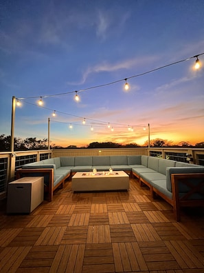 Enjoy a gorgeous sunset on our dreamy newly renovated roof deck!