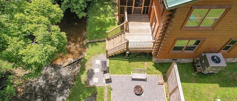 Your Smoky Mountain escape sits right next to a creek.