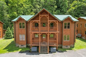 Large cabin with multiple outdoor areas.