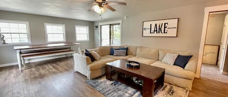 Lots of space in this open living room and kitchen area.