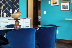 Whip up meals or answer emails in this stylish kitchen with built-in counter seating that doubles as a workspace. Includes a dining table for six, stainless appliances, and a coffee & tea station to fuel your day in downtown Prescott.