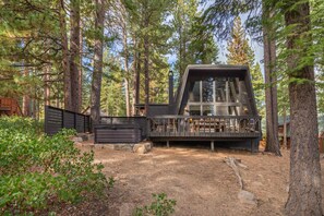 View of cabin and backyard