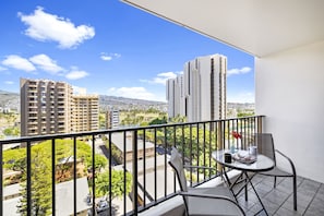 Balcony with city and mountain view