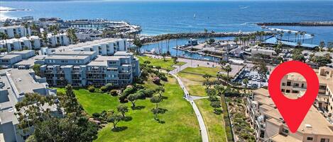 Overlooking the beautiful Czuleger Park, and steps from the boardwalk & marina!