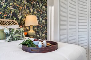 The master bedroom suite is comfortable and stylish. There is an en-suite bathroom, plenty of closet space, and smart HD TV.