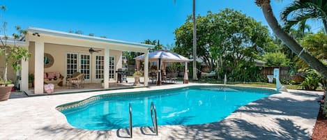Play in the Impressive large pool for hours of enjoyment for the whole family. The pool deck has covered lounging and dining areas, a BBQ, a new hot tub, a basketball hoop, and games.