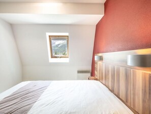 Get a peaceful night sleep in our cozy bedroom.