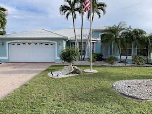 Front of the house in a great neighborhood.   New coastal feel.