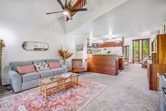 Two-story condo in central Poipu with lanai, pool & W/D - walk to Baby Beach