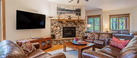 Living Room with Fireplace and TV