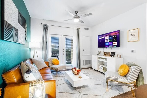 Unwind and relax in this great space created with you in mind! Great for conversations with family and friends, relaxing, and watching a movie on the 55-inch Smart TV.