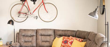 Comfy living room with electronic recliners on each side of the sectional 