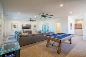 FUN upstairs living room with games!