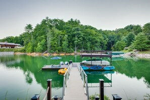 Private dock, kayaks, paddle board, paddle boat, lounge chairs, umbrella, swim