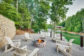 Firepit with cooking grate and roasting forks, Adirondack chairs